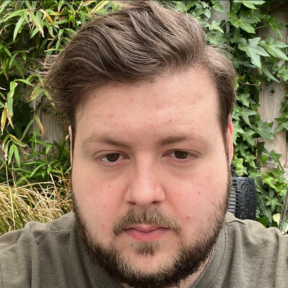A portrait headshot of Benjamin Shepherd